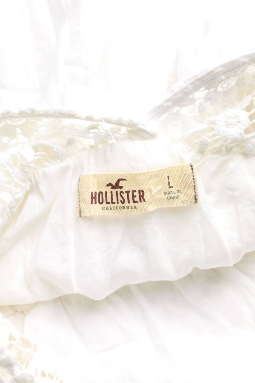 Carou HOLLISTER Kleid aus Spitze mit tiefem Rückenausschnitt Begrenztes Angebot